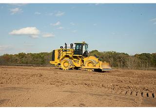 Kompaktor odpadów Caterpillar 825K