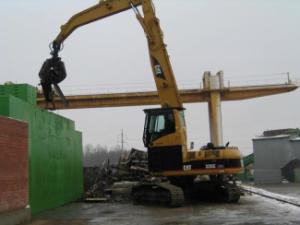 Koparki gąsienicowe Caterpillar 325 C MH