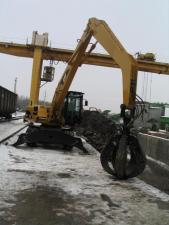 Koparki kołowe Caterpillar M 318 C MH