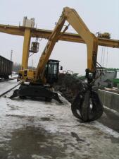 Koparki kołowe Caterpillar M 318 C MH