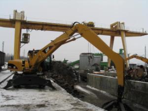 Koparki kołowe Caterpillar M 318 C MH