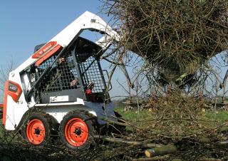 Ładowarki o sterowaniu burtowym Bobcat S100