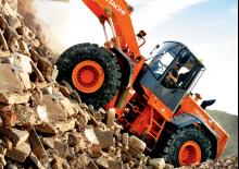 Ładowarki kołowe Hitachi LX 210 E