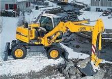 Koparki kołowe Liebherr A 311 Litronic