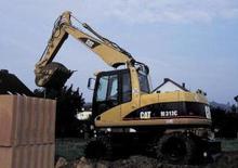 Koparki kołowe Caterpillar M 313 C Mono
