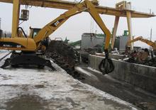 Koparki kołowe Caterpillar M 318 C MH