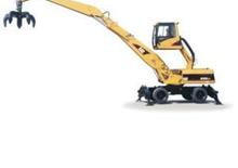 Koparki kołowe Caterpillar M 325 C MH