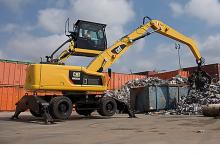 Koparki do prac przeładunkowych Caterpillar MH3022