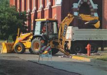 Koparko-ładowarki John Deere Construction 410 E