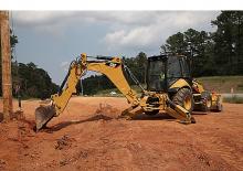 Koparko-ładowarki Caterpillar 450F