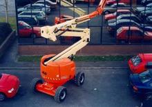 Kołowe przegubowe podnośniki koszowe JLG 450A Semi Track