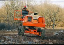 Kołowe przegubowe podnośniki koszowe JLG E400AJPN