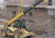 Ładowarki teleskopowe Caterpillar TH 63