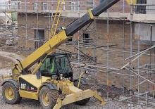 Ładowarki teleskopowe Caterpillar TH 82