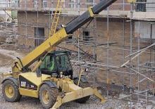 Ładowarki teleskopowe Caterpillar TH 83