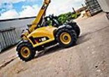 Ładowarki teleskopowe Caterpillar TH406