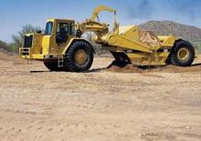 Zgarniarki Caterpillar 631 E ll