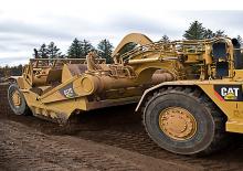 Zgarniarki Caterpillar 637G Auger