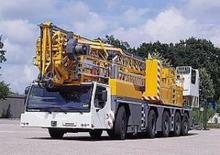 Żurawie wieżowe dolnoobrotowe z wysięgnikiem wodzakowym mocowane na ciężarówce Liebherr MK 100